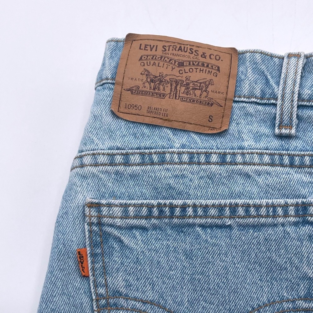 Vintage Levis 950 Orange Tab Relaxed Fit Tapered Leg Jeans Light Wash USA 13S